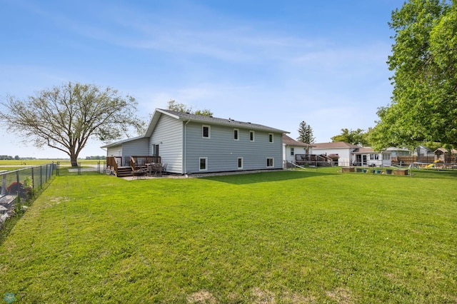 805 7th St NE, Dilworth, MN 56529 - back of property featuring a wooden deck