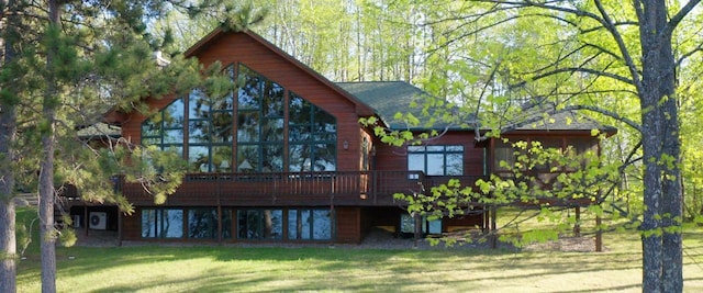 1880 Everett Rd S, Greenwood Twp, MN 55790 - back of property with a yard and a deck