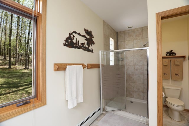 1880 Everett Rd S, Greenwood Twp, MN 55790 - bathroom featuring a stall shower, toilet, and tile patterned flooring