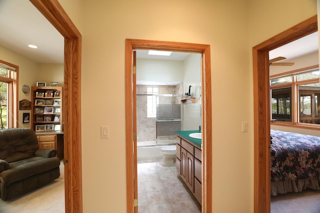 1880 Everett Rd S, Greenwood Twp, MN 55790 - hallway featuring a sink and light tile patterned flooring