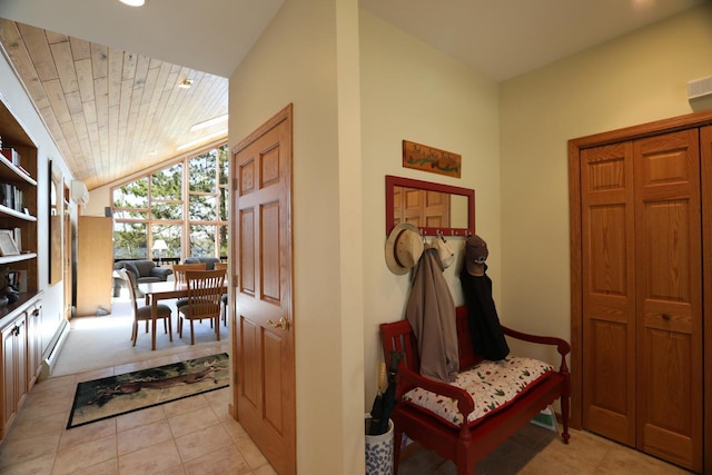 1880 Everett Rd S, Greenwood Twp, MN 55790 - entrance foyer with light tile patterned floors, lofted ceiling, and light colored carpet