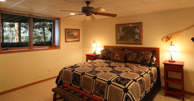 1880 Everett Rd S, Greenwood Twp, MN 55790 - carpeted bedroom featuring baseboards and a drop ceiling