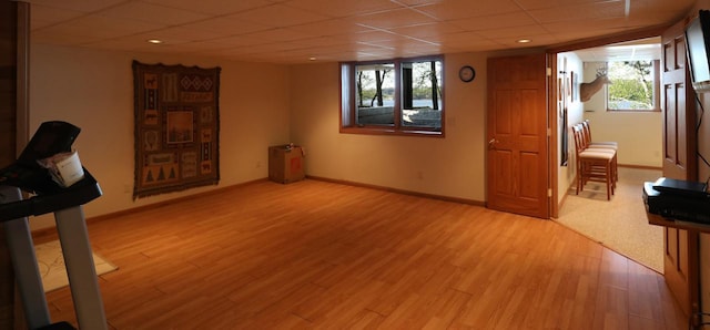 1880 Everett Rd S, Greenwood Twp, MN 55790 - basement with a paneled ceiling, light wood finished floors, and baseboards