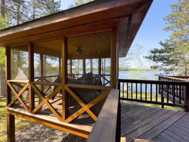1880 Everett Rd S, Greenwood Twp, MN 55790 - wooden deck with a water view and a sunroom
