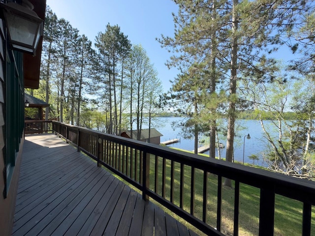 1880 Everett Rd S, Greenwood Twp, MN 55790 - wooden terrace with a water view and a boat dock