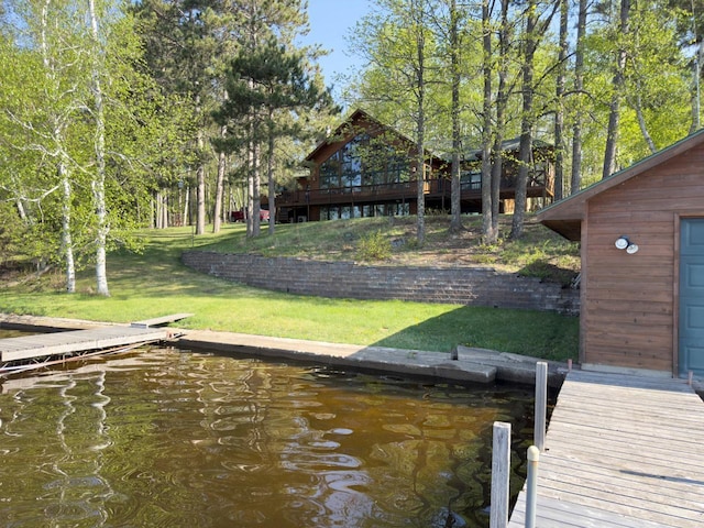 1880 Everett Rd S, Greenwood Twp, MN 55790 - dock featuring a lawn and a water view