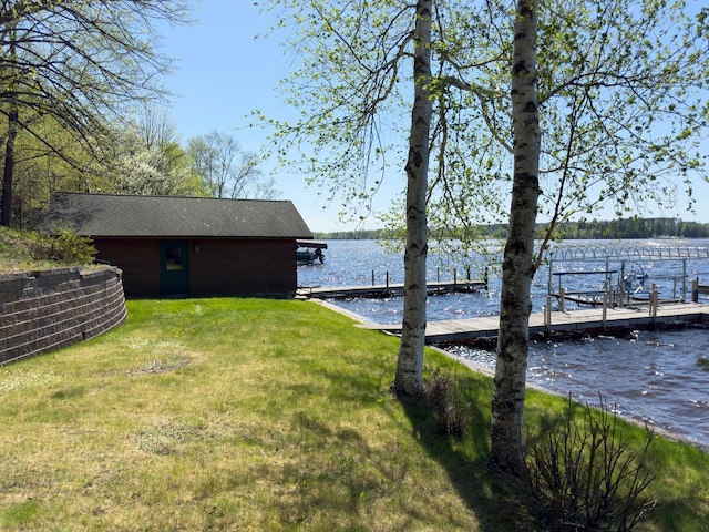 1880 Everett Rd S, Greenwood Twp, MN 55790 - view of grassy yard featuring a dock and a water view