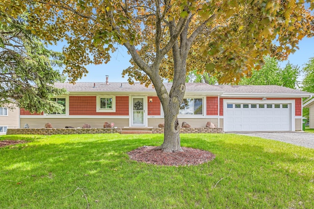 11841 Narcissus St NW, Coon Rapids, MN 55433 - ranch-style house featuring a garage, driveway, and a front yard