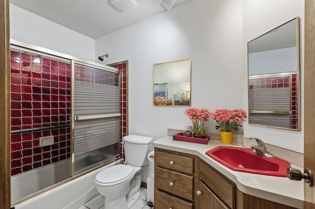 4017 Fordham Dr NE, Saint Anthony, MN 55421 - bathroom featuring toilet, vanity, enclosed tub / shower combo, and tile patterned flooring
