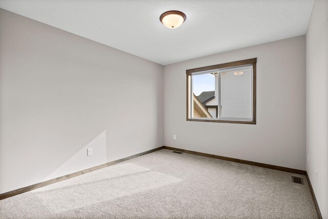 872 Watertown Ave, Delano, MN 55328 - carpeted empty room featuring baseboards