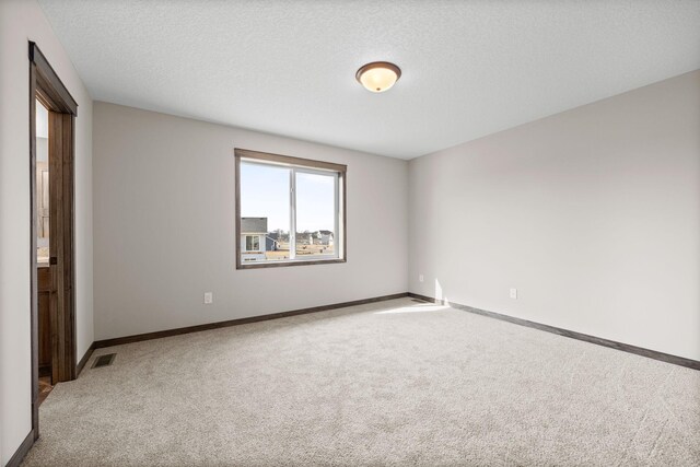 872 Watertown Ave, Delano, MN 55328 - unfurnished room featuring carpet flooring and baseboards