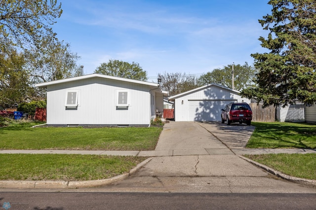 3017 8th St N, Fargo, ND 58102 - view of front of home with a front lawn and a garage