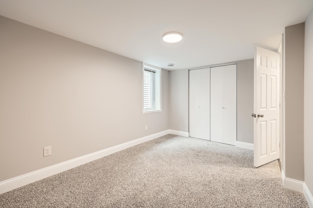 4245 11th Ave S, Minneapolis, MN 55407 - unfurnished bedroom with carpet, baseboards, and a closet