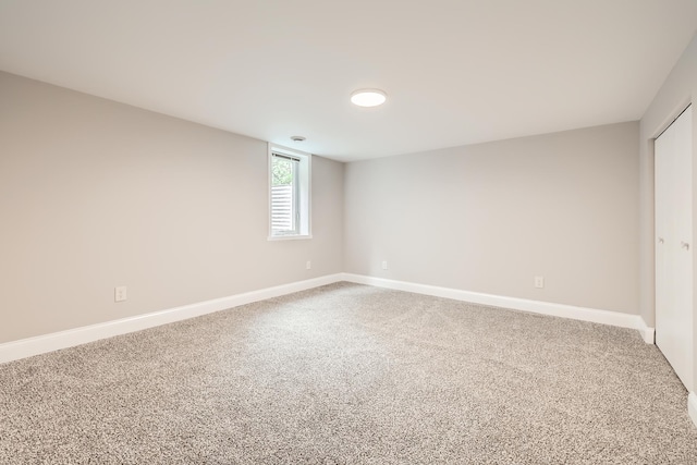 4245 11th Ave S, Minneapolis, MN 55407 - spare room with baseboards and carpet