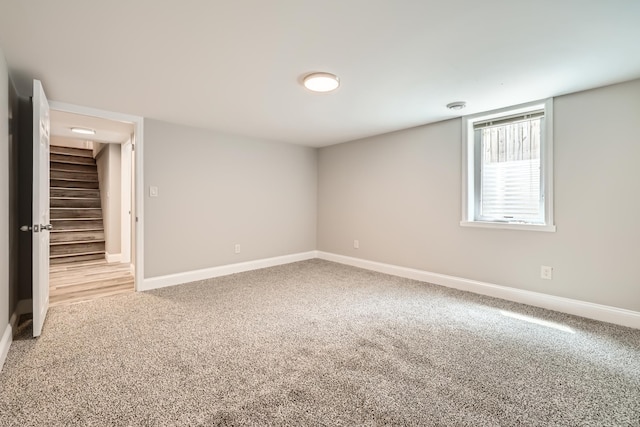 4245 11th Ave S, Minneapolis, MN 55407 - unfurnished room with stairs, carpet floors, and baseboards
