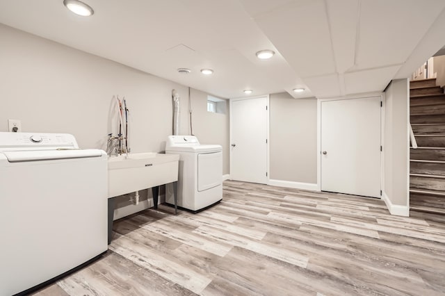 4245 11th Ave S, Minneapolis, MN 55407 - laundry area with washer and dryer, light wood-type flooring, and recessed lighting