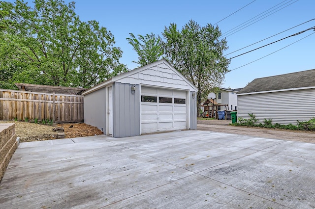 4245 11th Ave S, Minneapolis, MN 55407 - detached garage featuring concrete driveway
