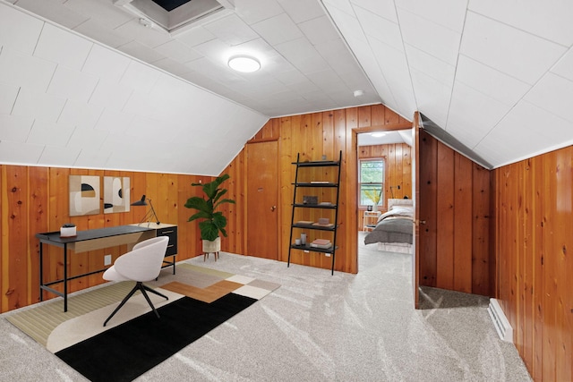 719 9th St E, Glencoe, MN 55336 - carpeted home office with wood walls, vaulted ceiling, and a baseboard heating unit