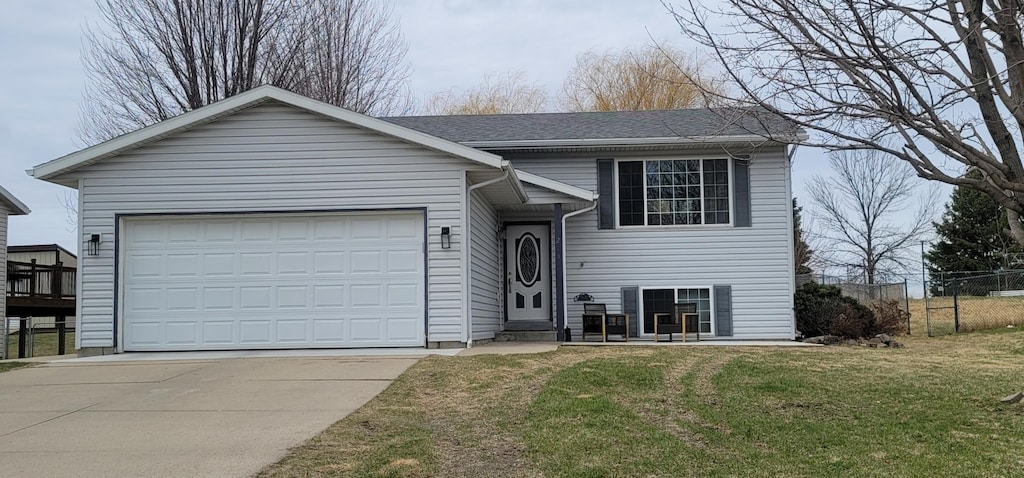 218 10th Ave NW, Byron, MN 55920 - view of front of home with driveway and a garage