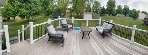 218 10th Ave NW, Byron, MN 55920 - wooden deck featuring a yard