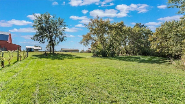 19334 105th Ave, Hayland Twp, MN 56353 - view of green lawn featuring a barn