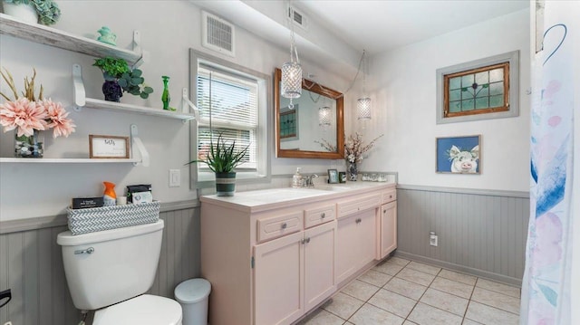 19334 105th Ave, Hayland Twp, MN 56353 - bathroom with a wainscoted wall, vanity, and tile patterned floors