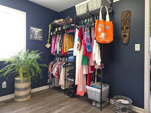 19334 105th Ave, Hayland Twp, MN 56353 - walk in closet featuring wood finished floors