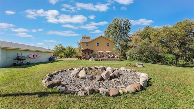 19334 105th Ave, Hayland Twp, MN 56353 - view of grassy yard featuring a wooden deck