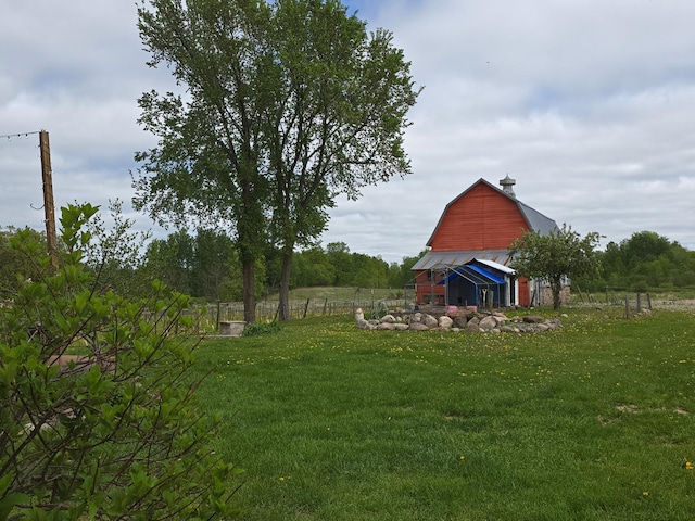 19334 105th Ave, Hayland Twp, MN 56353 - view of yard with a barn, an outdoor structure, and a detached garage