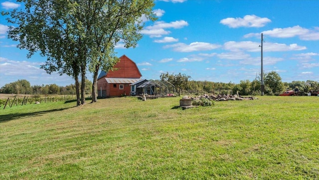 19334 105th Ave, Hayland Twp, MN 56353 - view of grassy yard featuring a barn and an outbuilding