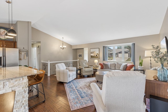 3664 Canary Way, Eagan, MN 55123 - living room featuring vaulted ceiling, dark wood-type flooring, and a chandelier