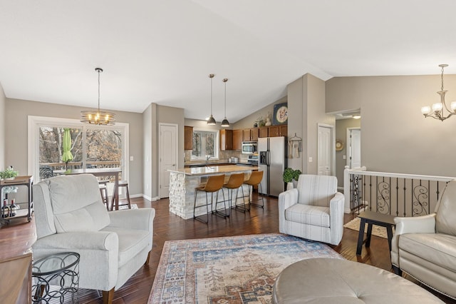 3664 Canary Way, Eagan, MN 55123 - living room featuring a chandelier, vaulted ceiling, baseboards, and dark wood-style floors