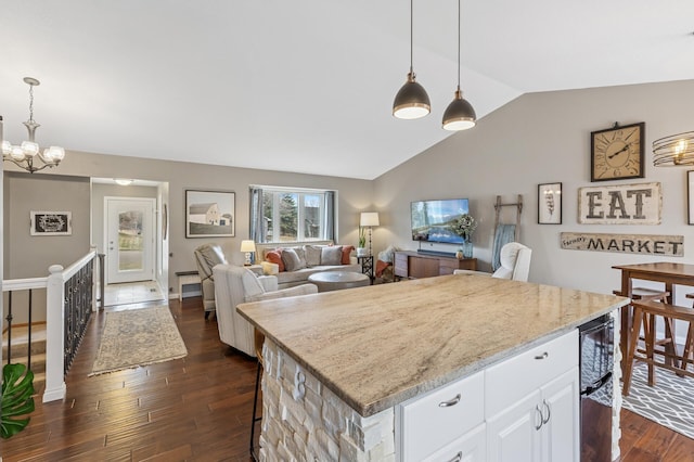 3664 Canary Way, Eagan, MN 55123 - kitchen with vaulted ceiling, dark wood-type flooring, white cabinets, a chandelier, and pendant lighting