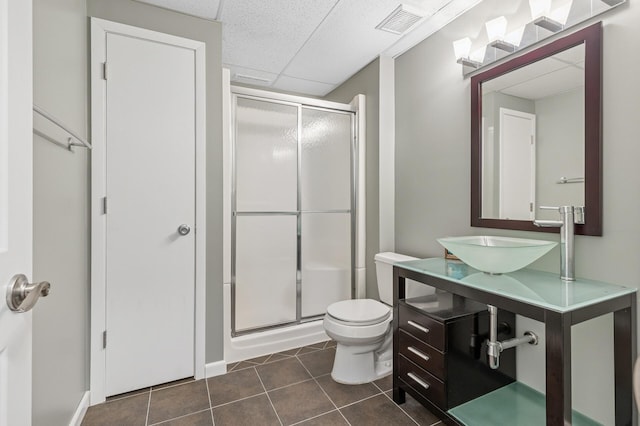 3664 Canary Way, Eagan, MN 55123 - full bathroom with a shower stall, tile patterned flooring, toilet, and vanity