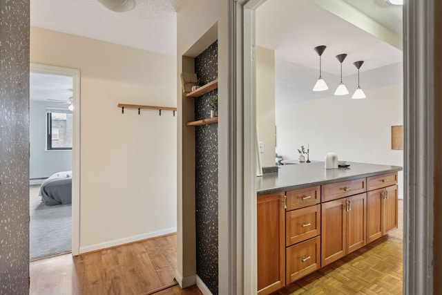 1912 Dupont Ave S Unit 302, Minneapolis, MN 55403 - bathroom featuring vanity, ensuite bath, wood finished floors, and a baseboard radiator