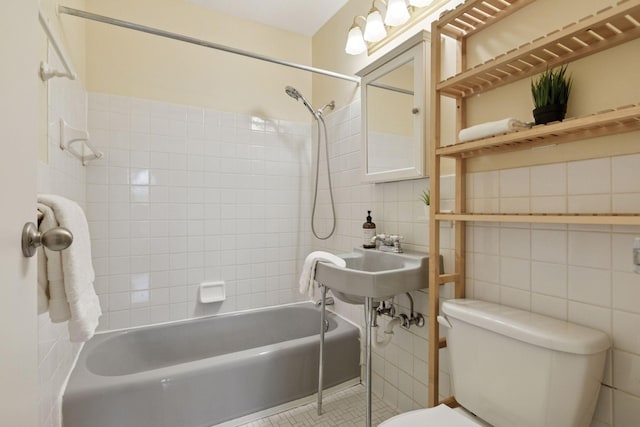 1912 Dupont Ave S Unit 302, Minneapolis, MN 55403 - bathroom featuring tile walls, toilet, and shower / bathtub combination
