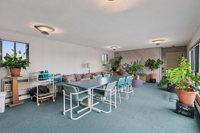 1912 Dupont Ave S Unit 302, Minneapolis, MN 55403 - carpeted dining space with a textured ceiling and a wall unit AC