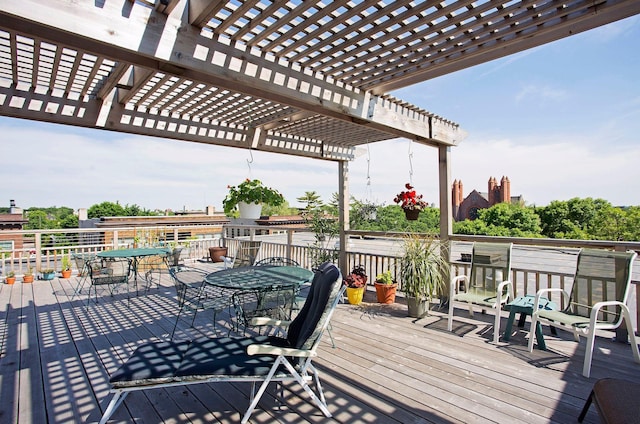 1912 Dupont Ave S Unit 302, Minneapolis, MN 55403 - wooden terrace with a pergola and outdoor dining area