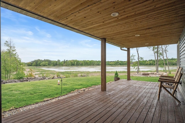 7410 313th Ave NE, North Branch Twp, MN 55056 - deck featuring a water view and a yard