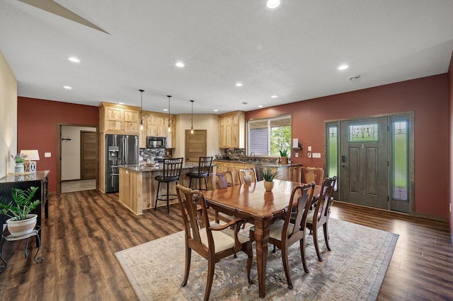7410 313th Ave NE, North Branch Twp, MN 55056 - dining room with recessed lighting, dark wood-type flooring, and baseboards