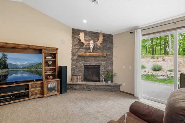 7410 313th Ave NE, North Branch Twp, MN 55056 - carpeted living room featuring vaulted ceiling and a fireplace