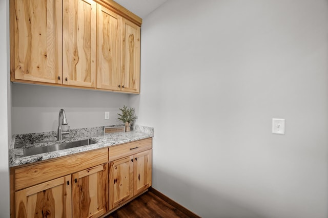 7410 313th Ave NE, North Branch Twp, MN 55056 - bar area with a sink, dark wood finished floors, and baseboards