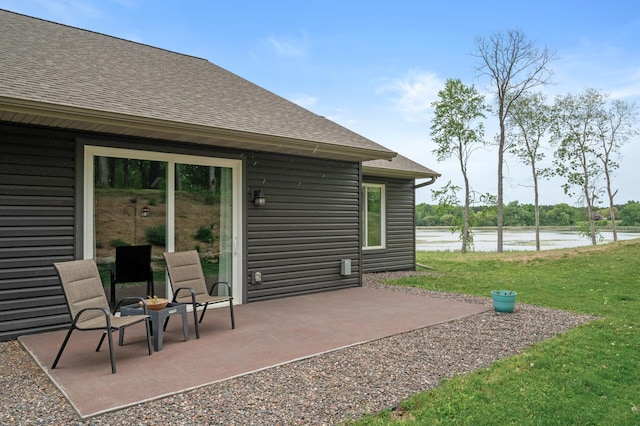 7410 313th Ave NE, North Branch Twp, MN 55056 - view of patio featuring a water view
