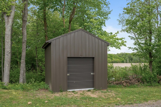 7410 313th Ave NE, North Branch Twp, MN 55056 - view of shed featuring a wooded view