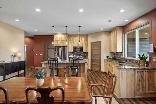 7410 313th Ave NE, North Branch Twp, MN 55056 - dining space featuring dark wood-style flooring, recessed lighting, and baseboards