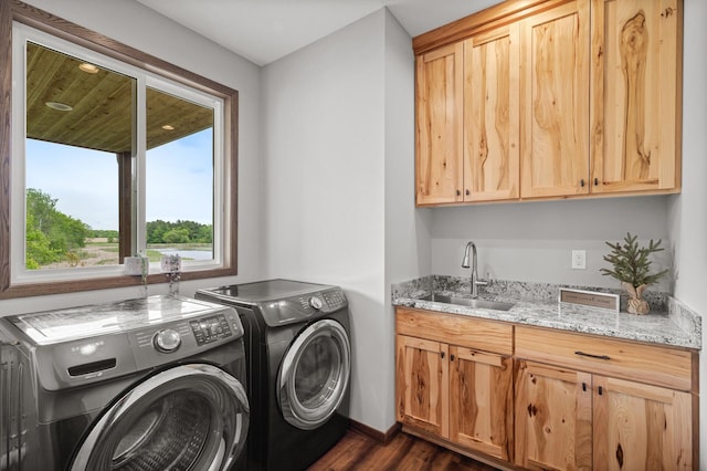 7410 313th Ave NE, North Branch Twp, MN 55056 - laundry room with separate washer and dryer, dark wood-style floors, cabinet space, and baseboards