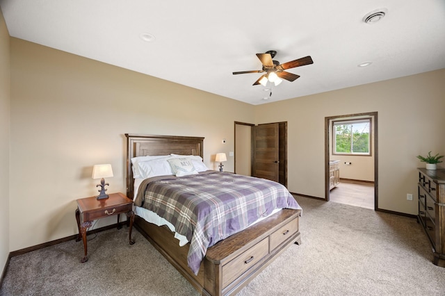 7410 313th Ave NE, North Branch Twp, MN 55056 - bedroom with light colored carpet, a ceiling fan, recessed lighting, and ensuite bath