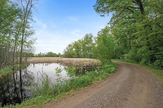 7410 313th Ave NE, North Branch Twp, MN 55056 - water view featuring a heavily wooded area