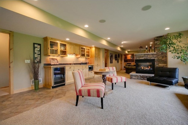 5177 Muir Ave N, Baytown Twp, MN 55082 - living area with beverage cooler, bar, recessed lighting, a fireplace, and baseboards