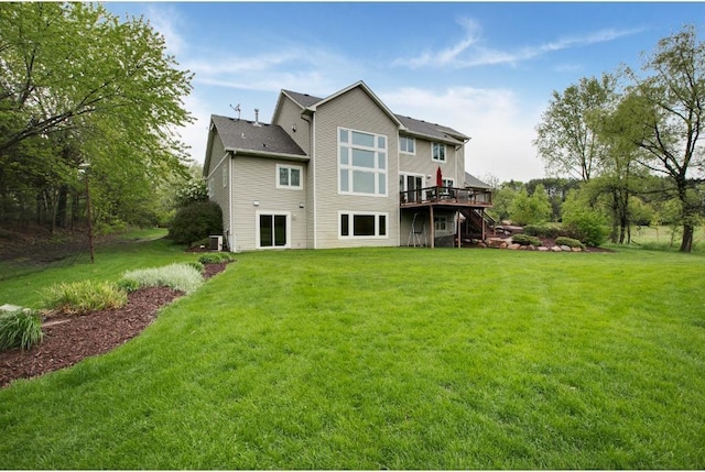 5177 Muir Ave N, Baytown Twp, MN 55082 - rear view of house with a deck, a lawn, and stairway